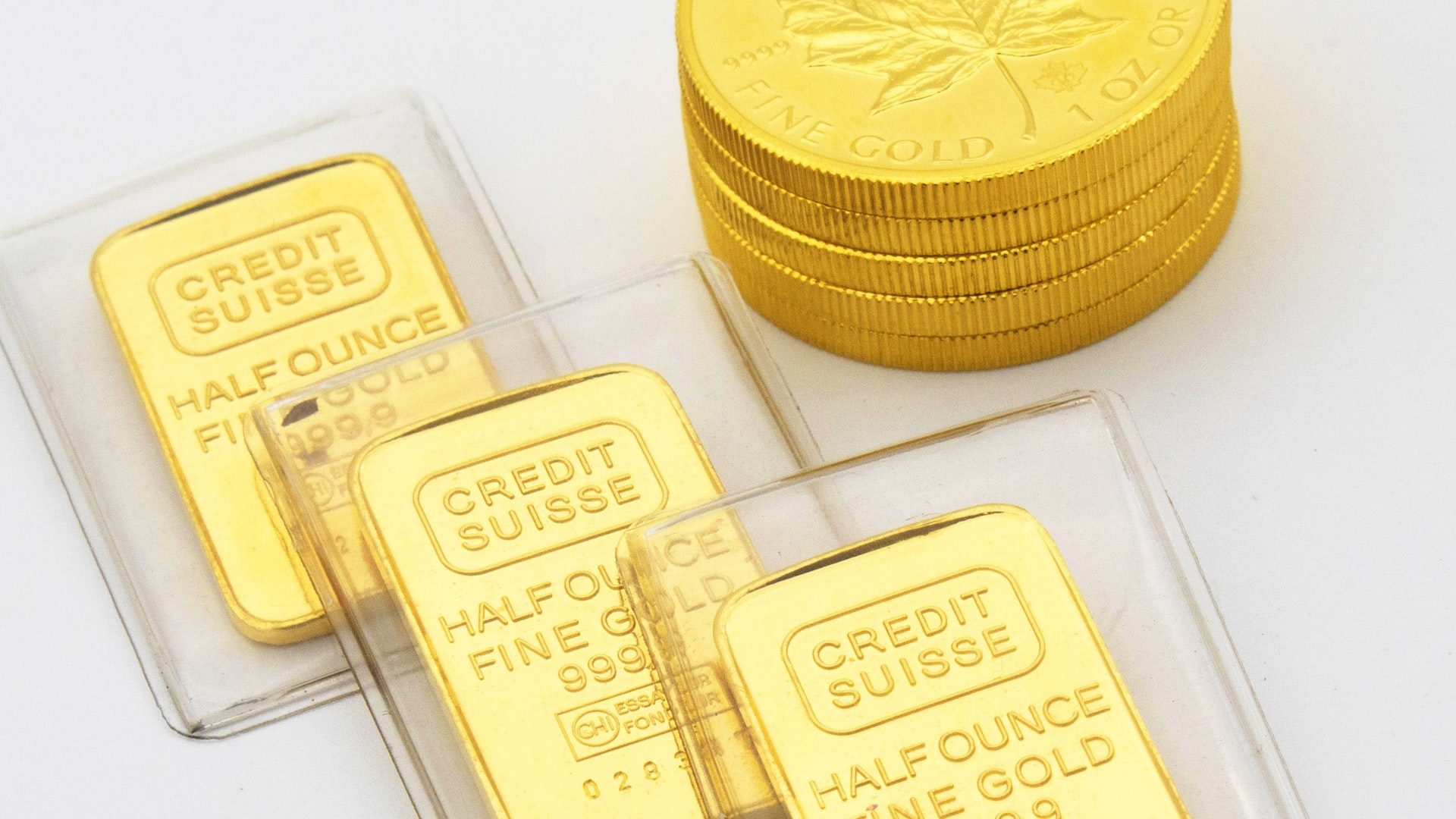 gold coins and bars and bullion