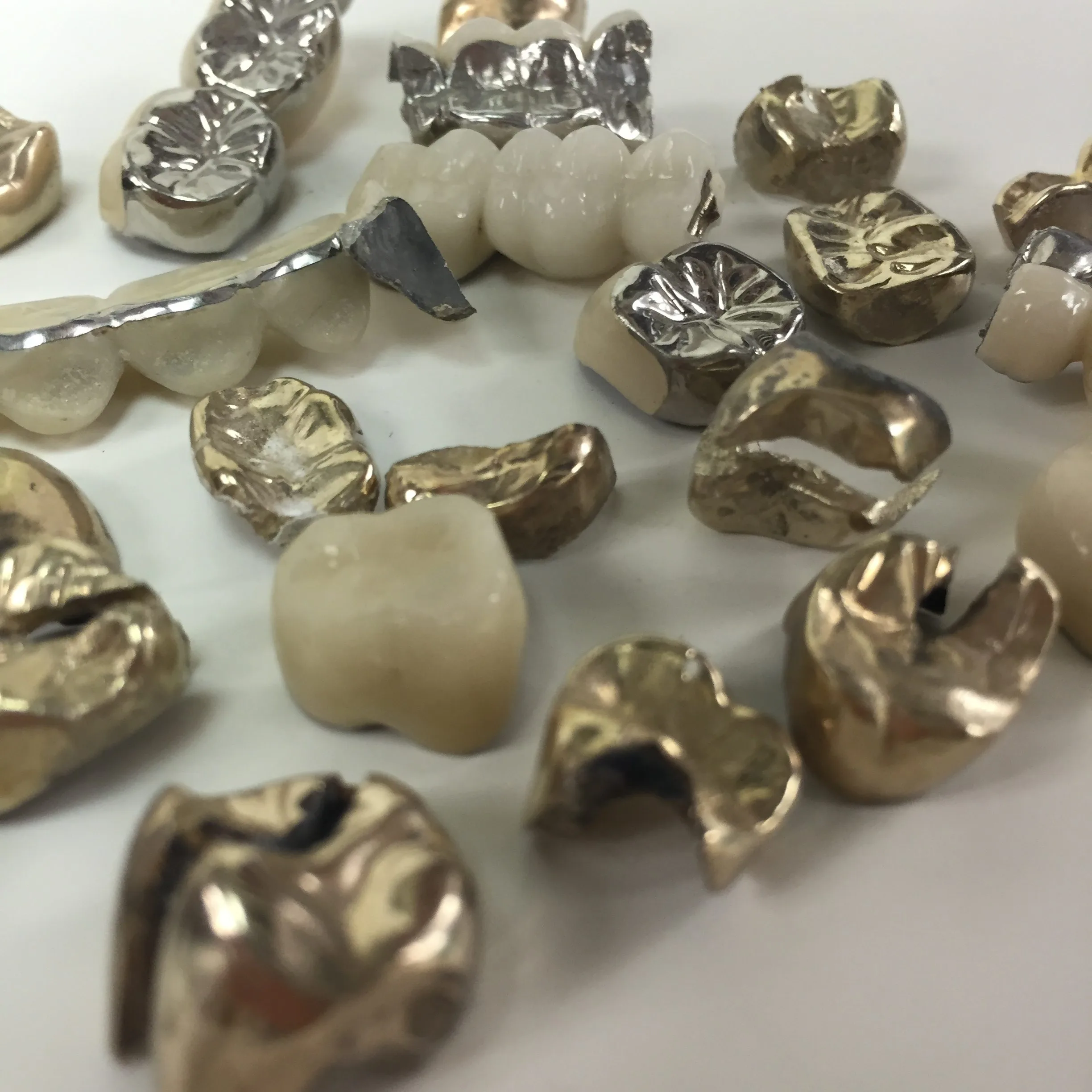 Gold and palladium dental crowns and Bridges