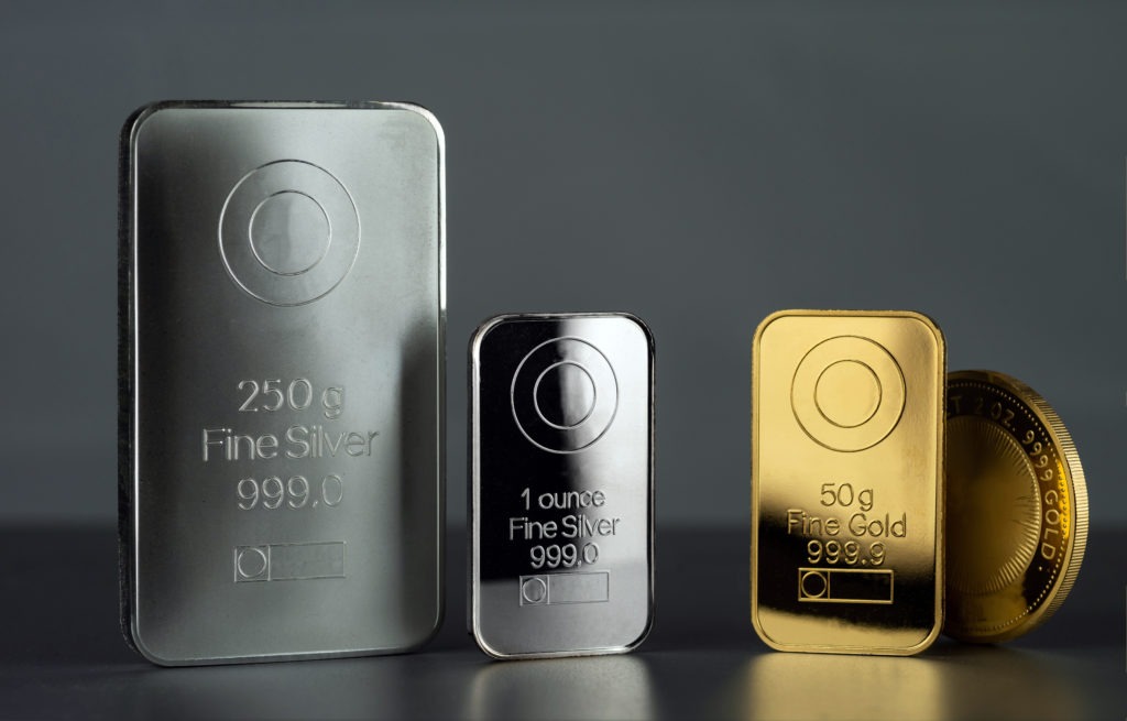 Gold and silver bullion on display.
