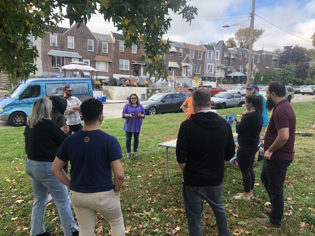 Garfield Refining staff planting trees as a sustainability initiative.