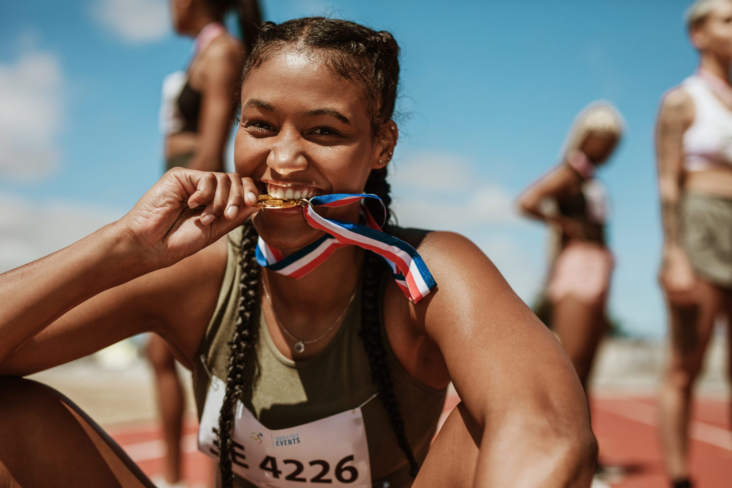 Why Do Olympians Bite Their Medals?