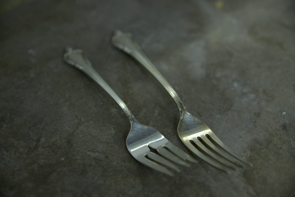 Two sterling silver forks.