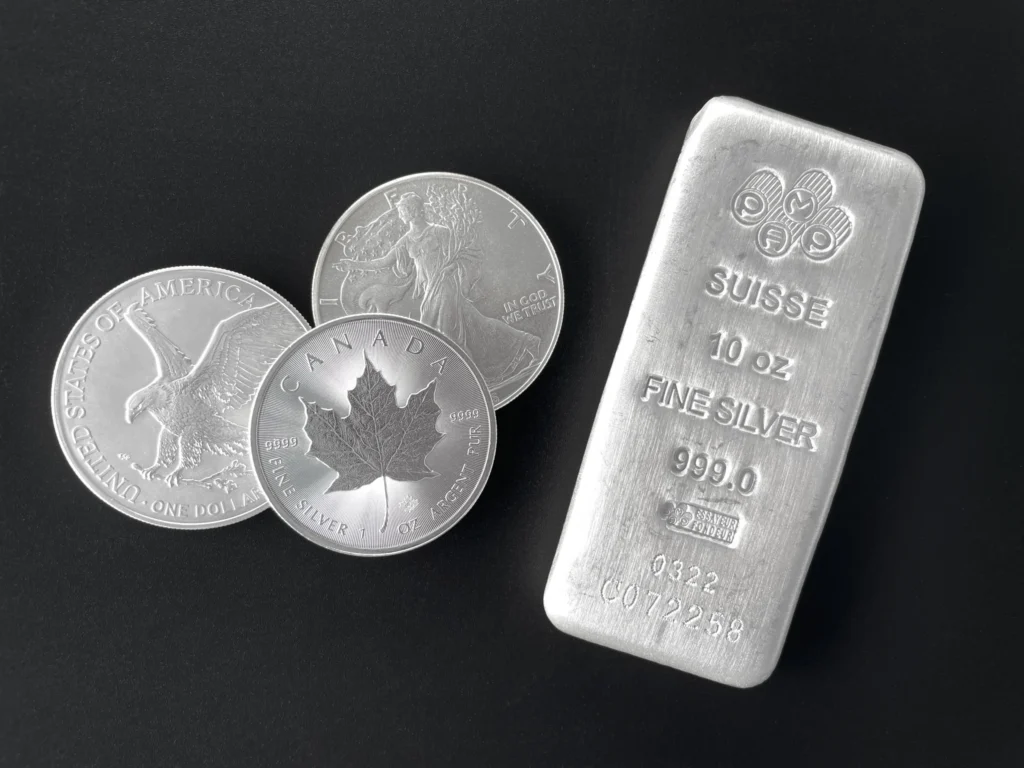 American and Canadian silver coins and a Swiss silver bar