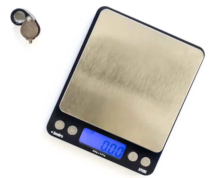 A jeweler's loupe and scale