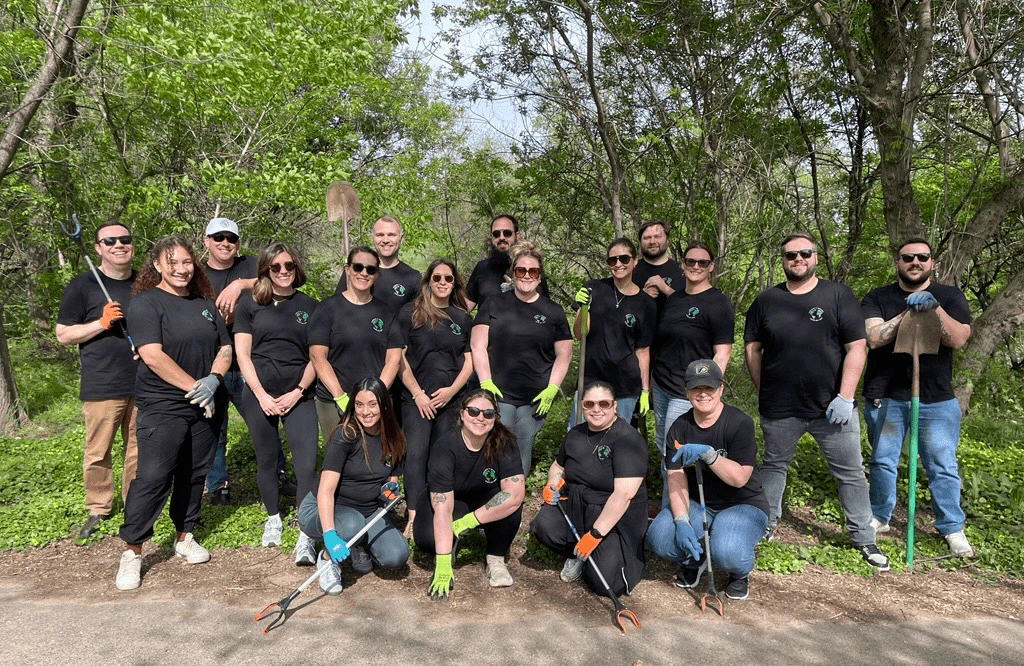 A group photo of the Garfield Refining team planting trees for Earth Day 2025 in Philadelphia